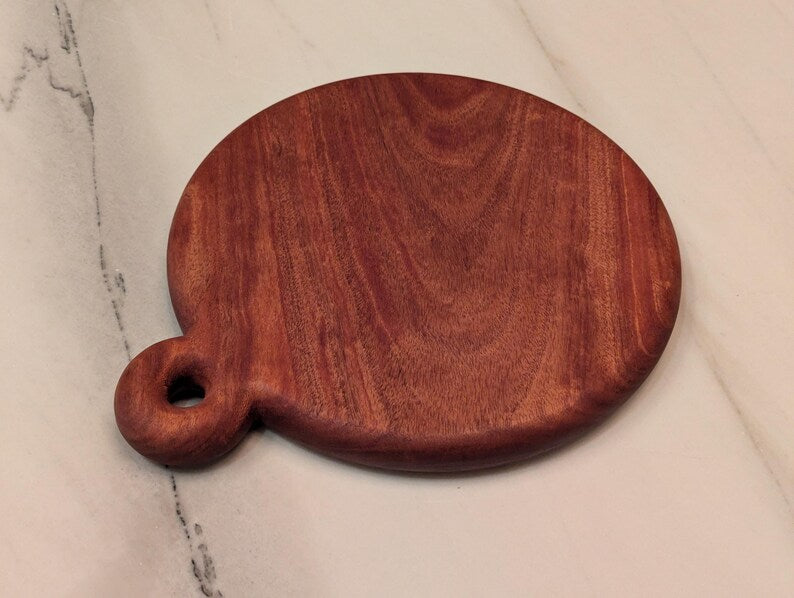 Round cherry cutting board, one thick piece