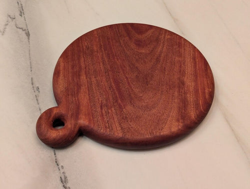 Round cherry cutting board, one thick piece
